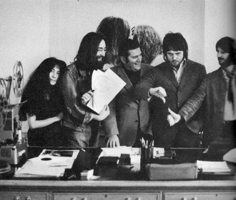 did the Beatles sign a new contract in 1969